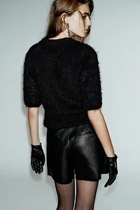 JUPE-SHORT PLISSÉE MATIÈRE SYNTHÉTIQUE