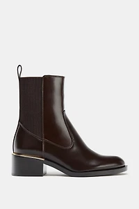 LOW HEELED ANKLE BOOTS WITH METALLIC DETAIL