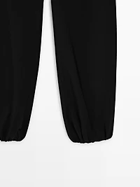 Wool sarouel trousers with tie detail