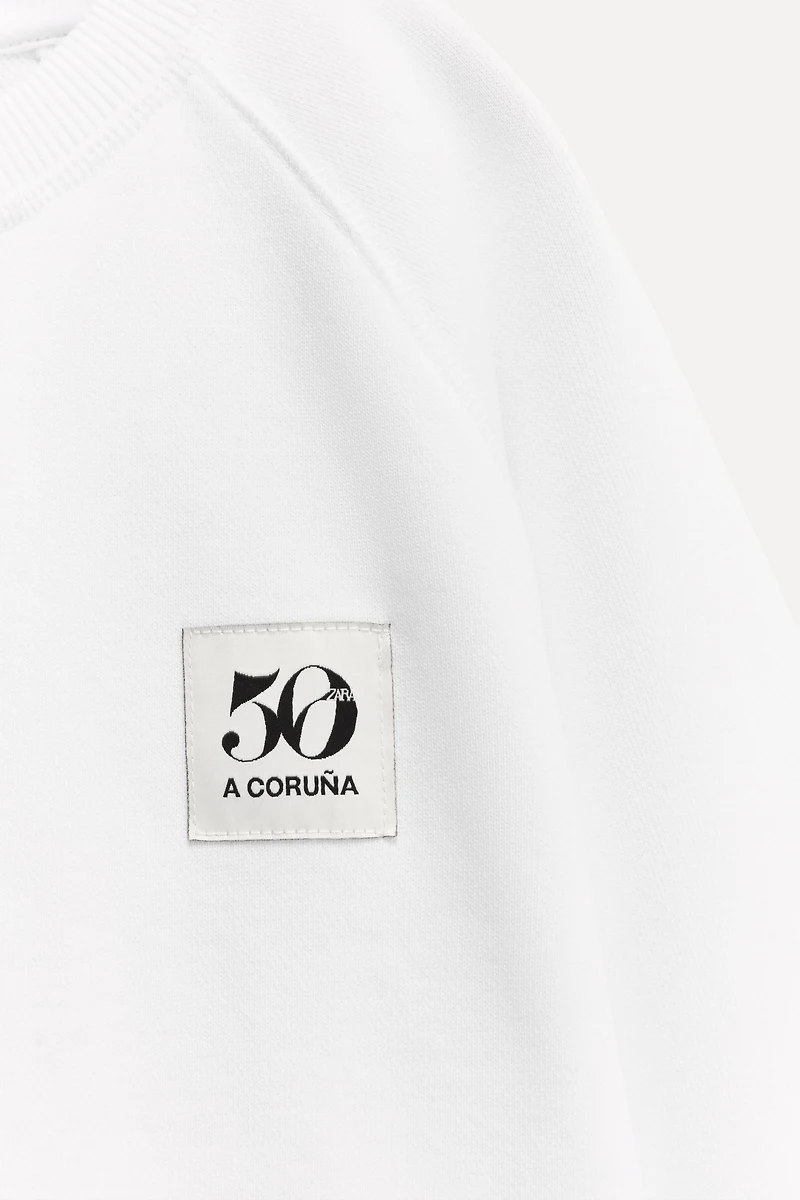 6 ANS/ SWEAT POCHE ÉTIQUETTE 50TH ANNIVERSARY