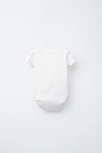 THREE-PACK OF SHORT SLEEVE BODYSUITS