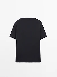 Short sleeve pyjama top and striped trousers