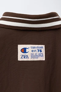 BLOUSON NYLON AVEC SAC CHAMPION ® X ZARA