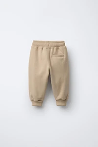 PANTALON DE JOGGING LOGO FLOCK
