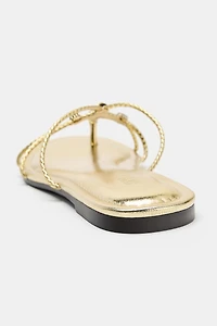 METALLIC EFFECT BRAIDED SANDALS