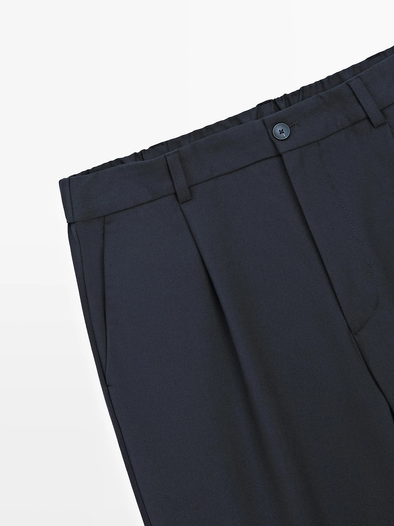 Relaxed fit darted wool blend trousers