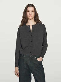 Short knit cardigan with raglan sleeves