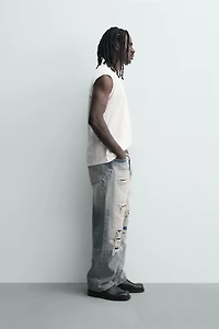 LOOSE FIT RIPPED JEANS