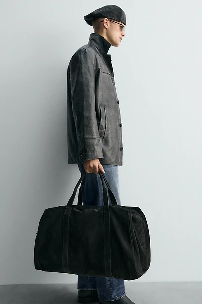 LIMITED EDITION LEATHER TRAVEL BAG
