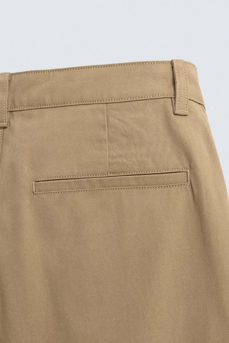PANTALON COUPE LARGE À PLIS