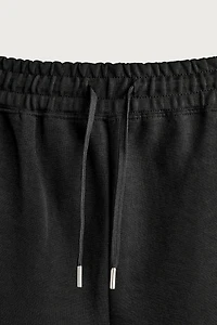 RELAXED FIT INTERLOCK TRACK SHORTS