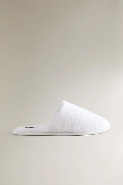 CHAUSSONS SERVIETTE DE BAIN