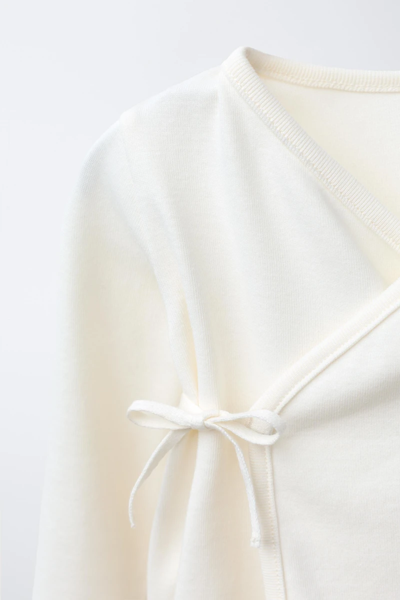 ENSEMBLE LAYETTE ET SA PETITE BOURSE