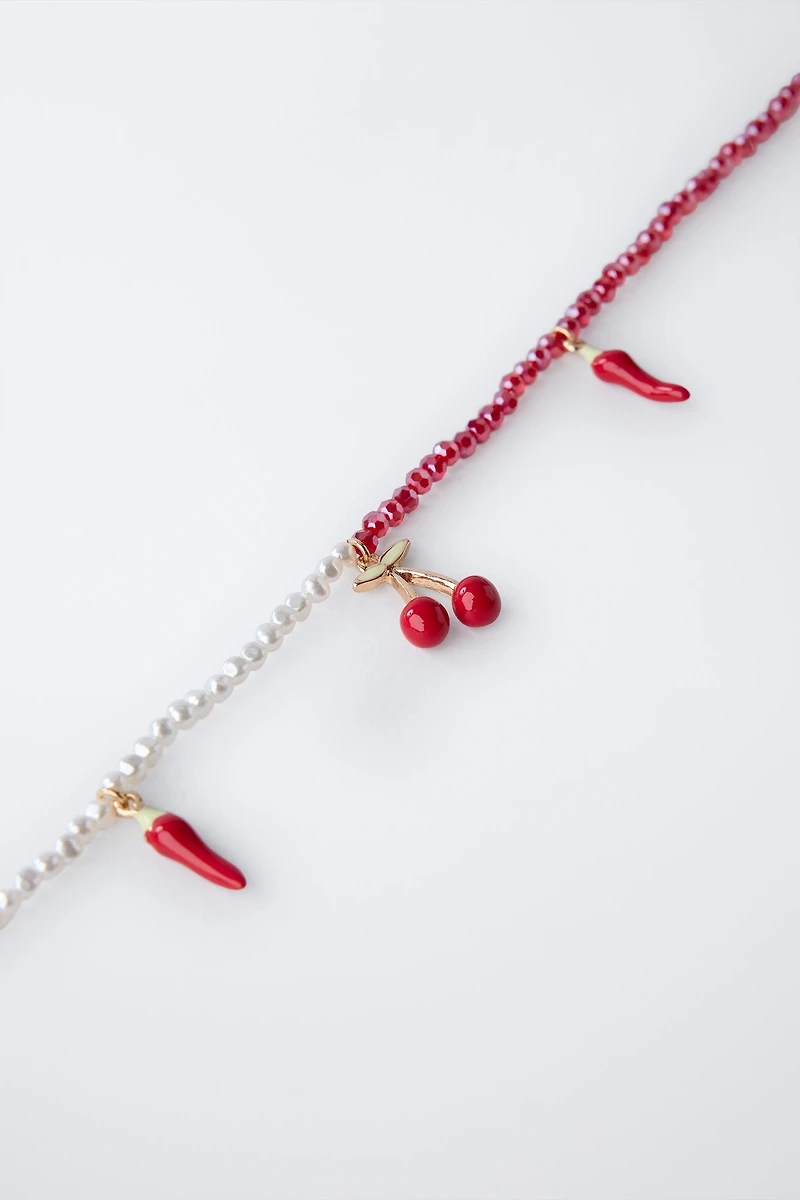 PEPPER AND CHERRY BEADED PENDANT