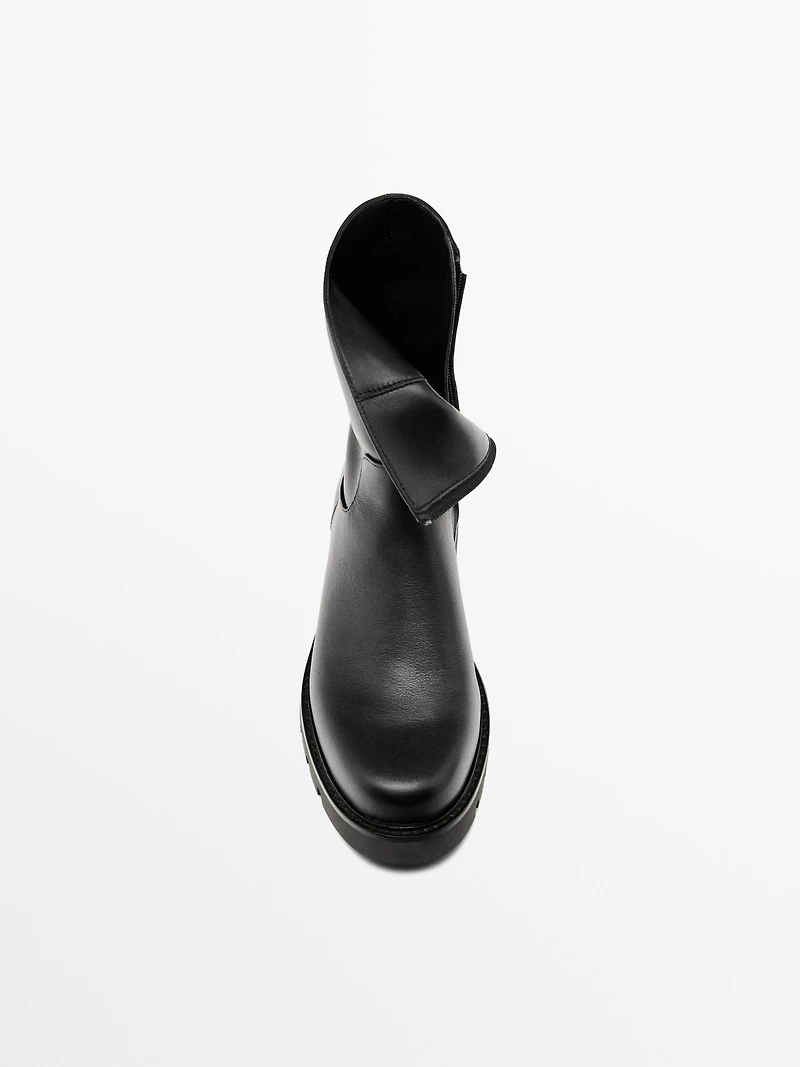 Track sole flat ankle boots