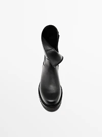 Track sole flat ankle boots
