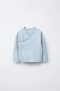 GILET EN MAILLE CROISÉ AJOURÉ