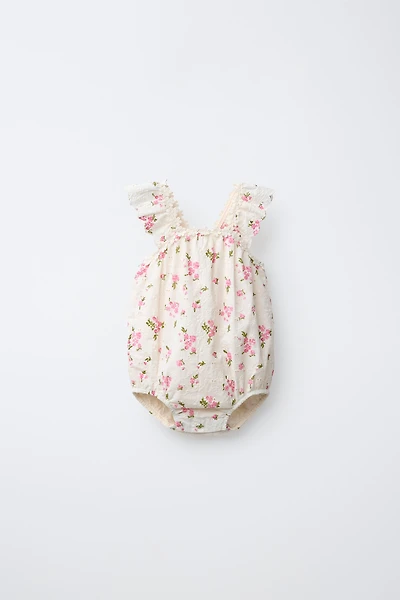 FLORAL EYELET ROMPER