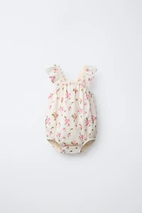 FLORAL EYELET ROMPER