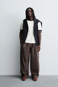 BALLOON FIT PLEATED PANTS