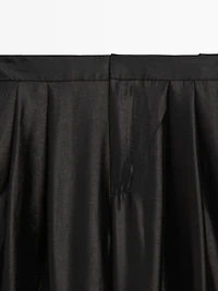 Wide-leg voluminous trousers with darts