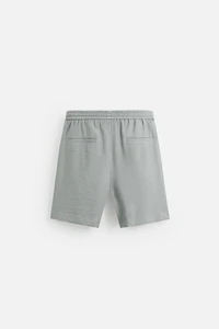 FLOWY RELAXED FIT BERMUDA SHORTS