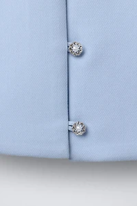 TOP AVEC BOUTON BIJOU