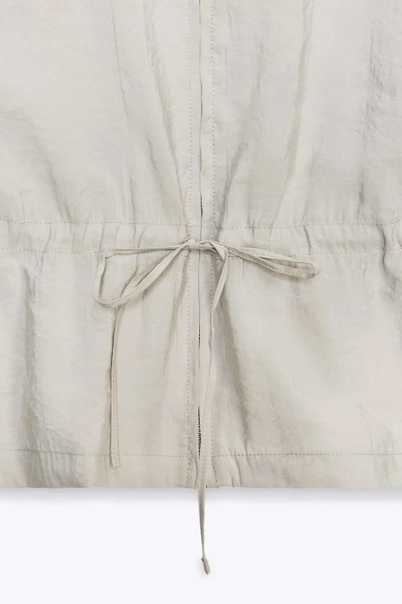 GILET FLUIDE AJUSTABLE