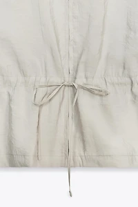 GILET FLUIDE AJUSTABLE