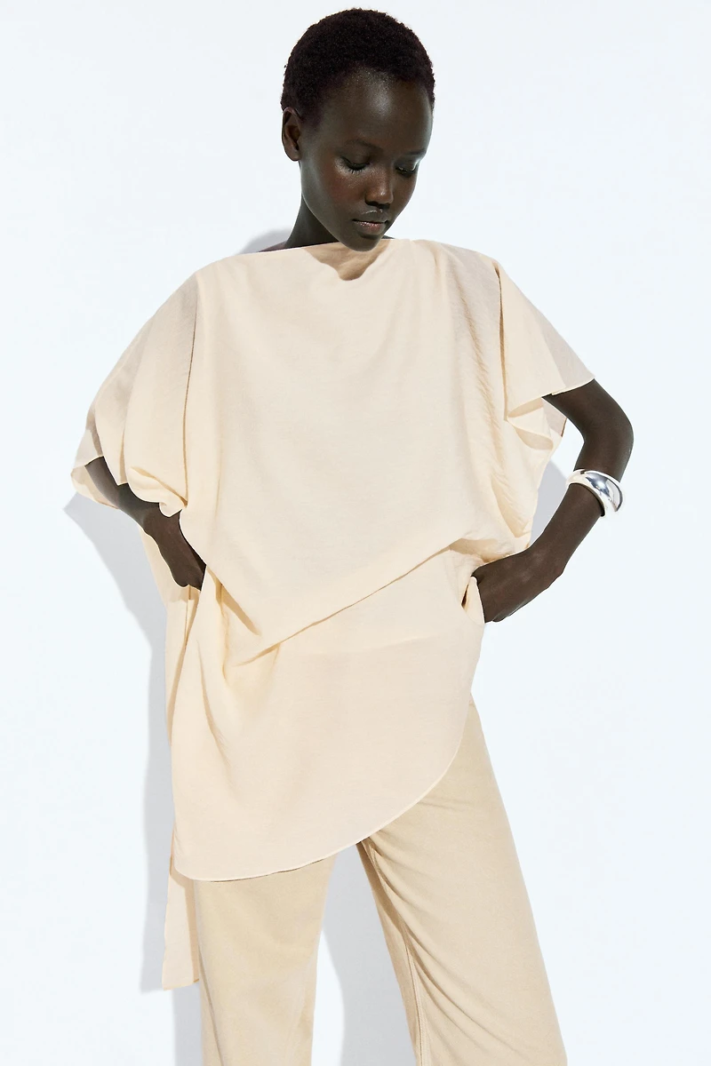 Asymmetric cape-style flowing blouse