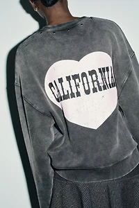 WASHED TEXT SWEATSHIRT