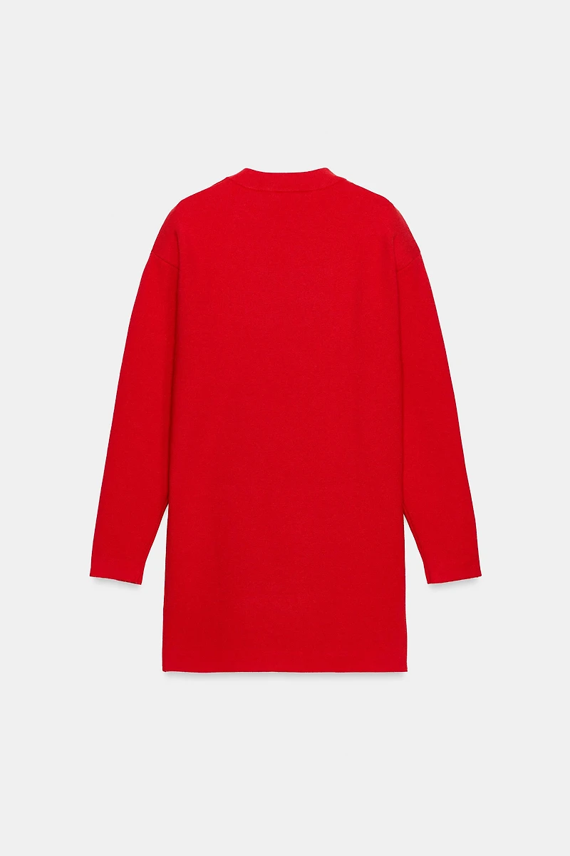 ROBE EN MAILLE À EMMANCHURE TOMBANTE