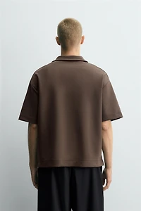 POLO INTERLOCK À ZIP