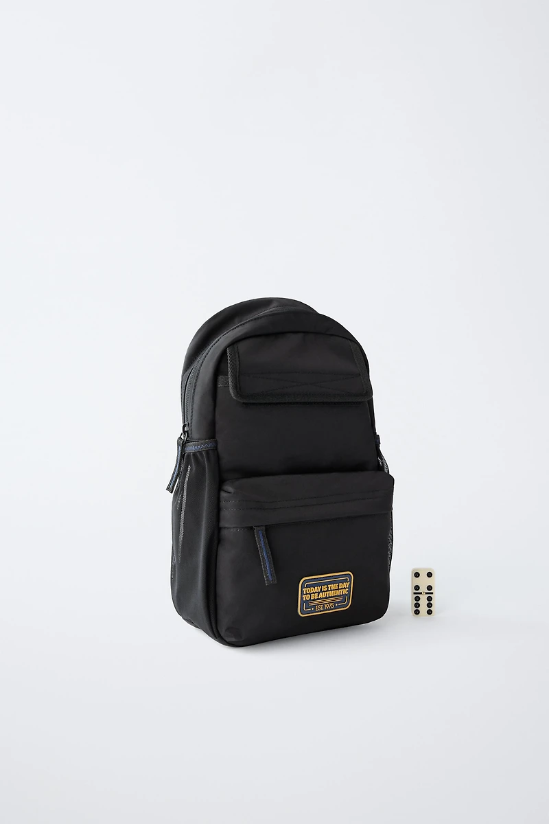 MULTI-POCKET CROSSBODY BAG