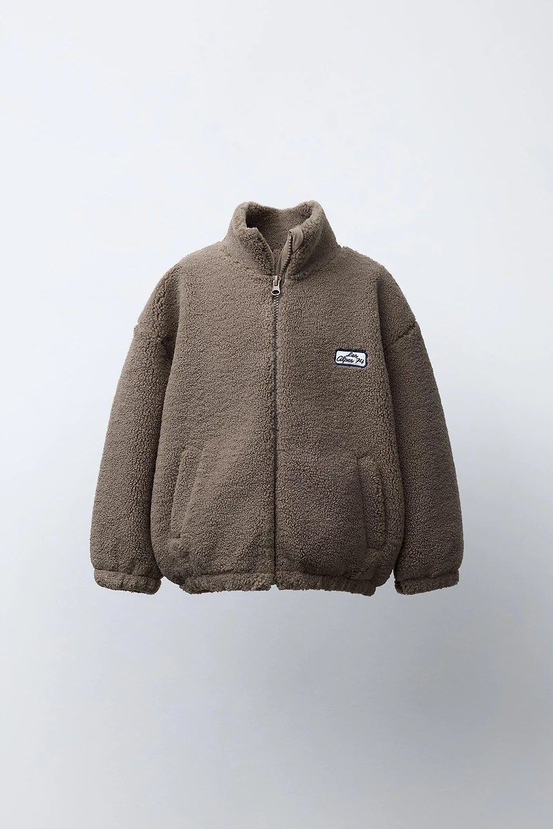 BLOUSON EFFET MOUTON BRODÉ