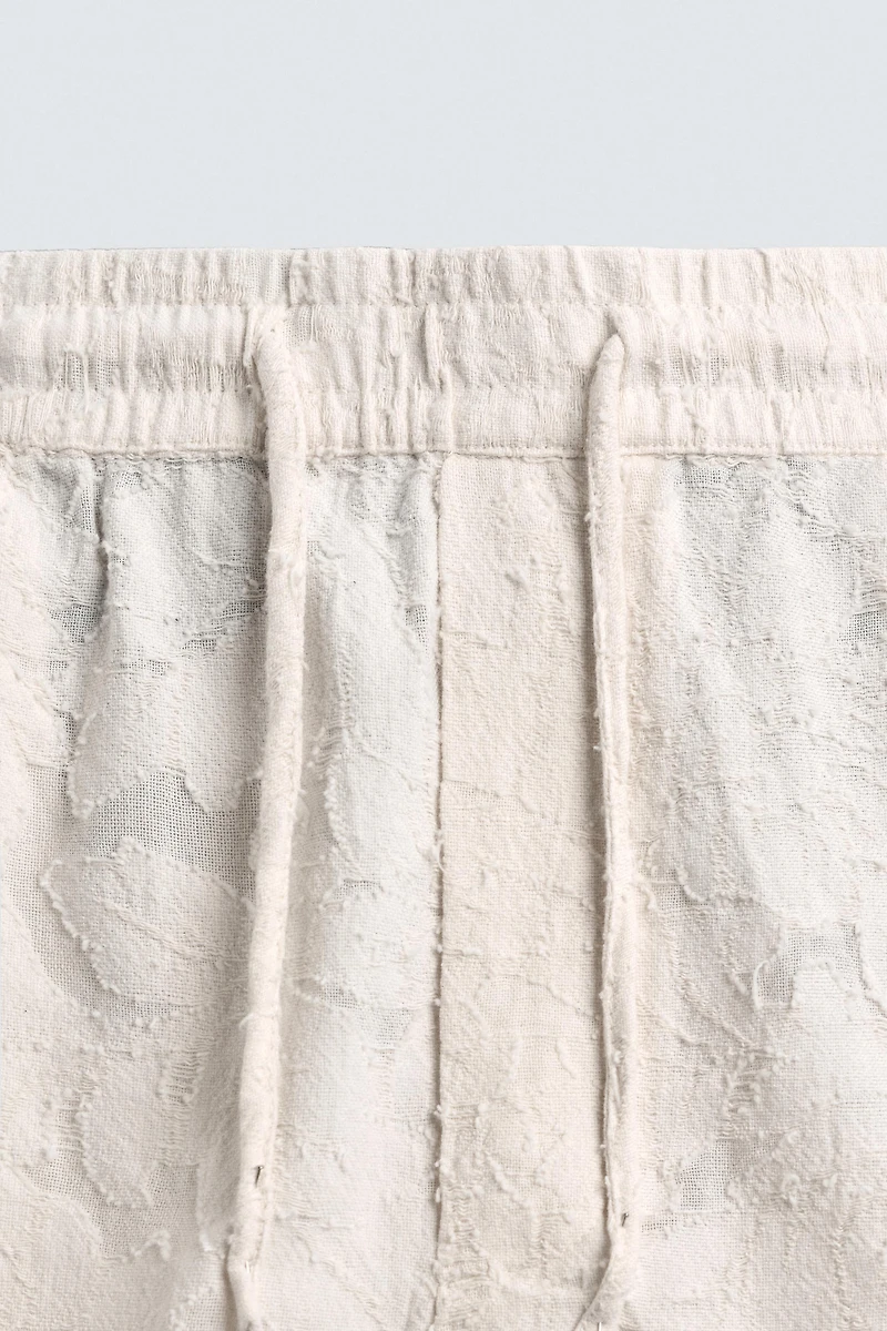 TEXTURED JACQUARD SHORTS
