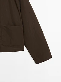 Cropped puffer jacket with covered buttons