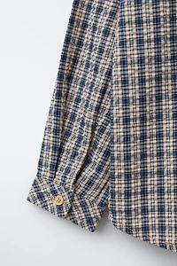 PLAID SHIRT SNOOPY PEANUTS™