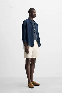 REGULAR FIT PLEATED BERMUDA SHORTS