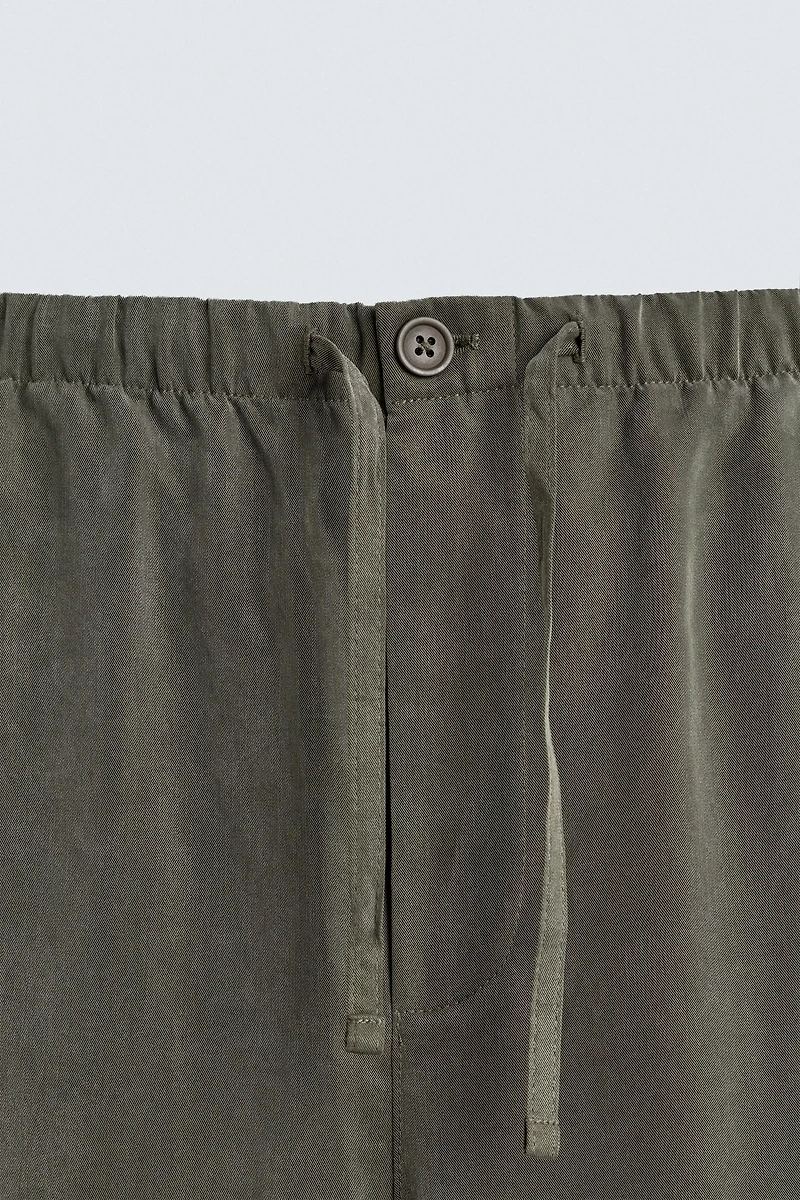 RELAXED FIT FLOWY PANTS