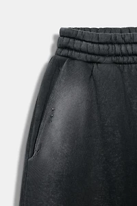 WASHED EFFECT RIPPED FLEECE PANTS