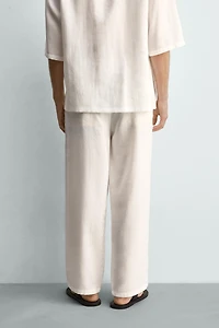 PANTALON FLUIDE À PLIS LATÉRAUX