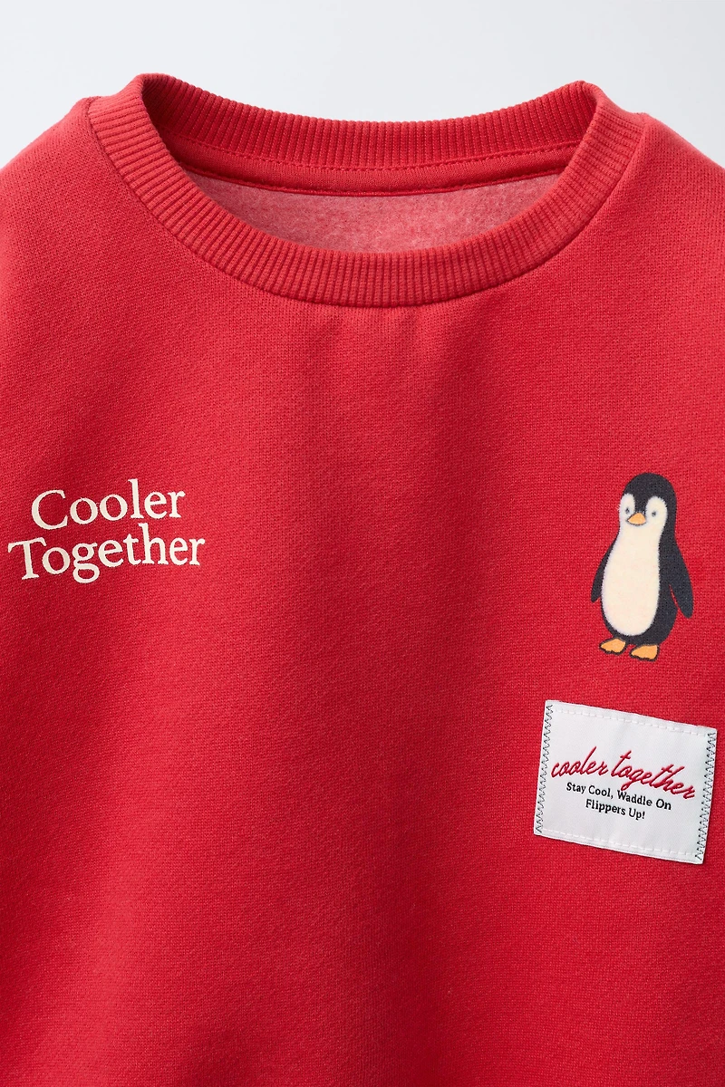 FLOCKED PENGUIN SWEATSHIRT