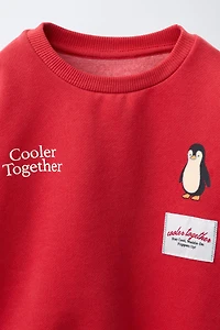 FLOCKED PENGUIN SWEATSHIRT