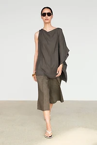 Asymmetric flowing cape top