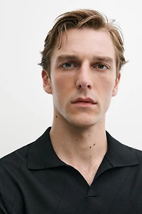 Argyle knit polo sweater