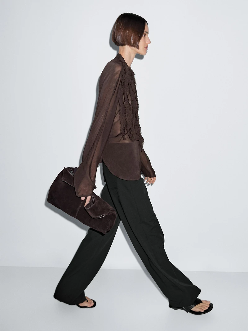 Flowing bib-front shirt with ruffles