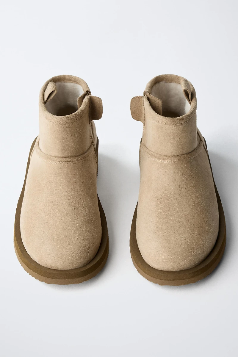 BOTTINES EFFET FOURRURE