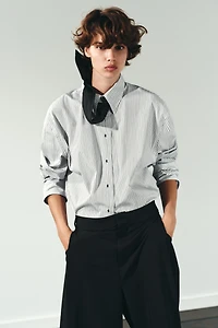PLEATED LONG SHORTS
