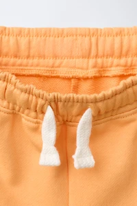 NUMBER PRINT JOGGING SHORTS